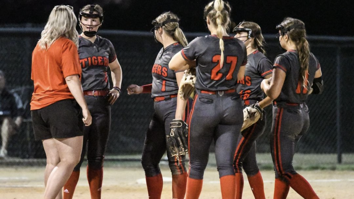 ADM Softball Triumphs Over Winterset in Extra-Inning Thriller